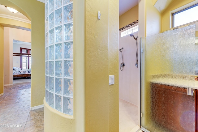 20609 N Canyon Whisper Dr, Surprise, AZ 85387 - bathroom with a textured wall, walk in shower, and a healthy amount of sunlight
