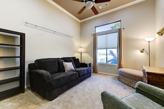 20609 N Canyon Whisper Dr, Surprise, AZ 85387 - living area featuring visible vents, ornamental molding, light carpet, baseboards, and a ceiling fan