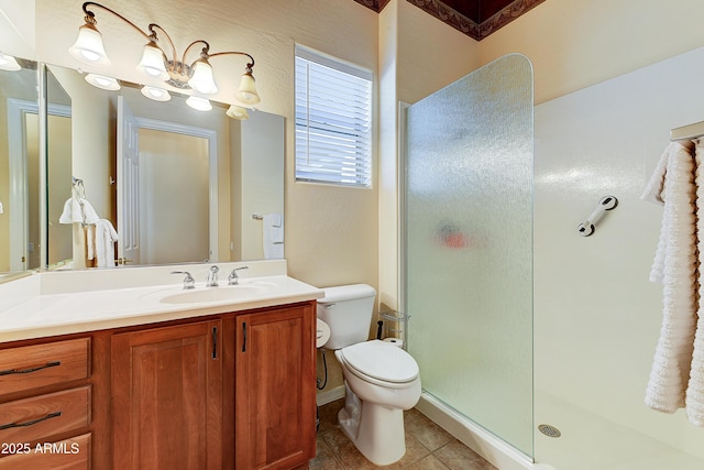 20609 N Canyon Whisper Dr, Surprise, AZ 85387 - bathroom featuring toilet, tile patterned floors, a shower stall, and vanity