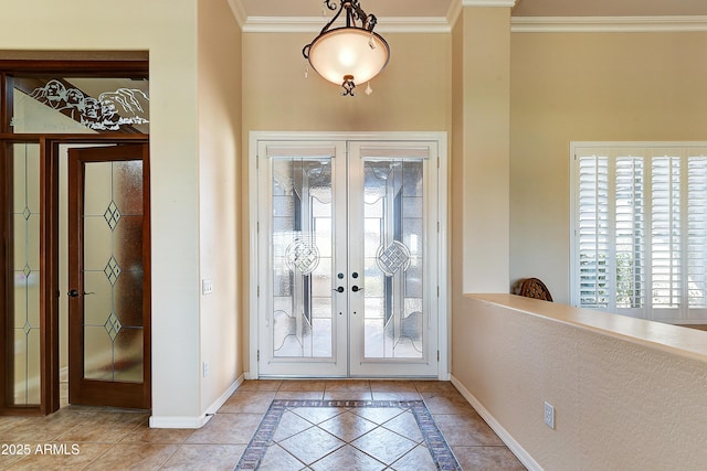 20609 N Canyon Whisper Dr, Surprise, AZ 85387 - entrance foyer featuring french doors, baseboards, crown molding, and light tile patterned floors