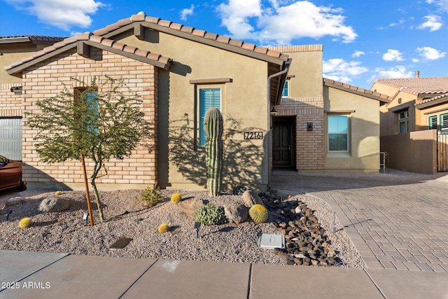 view of front of house with a patio area