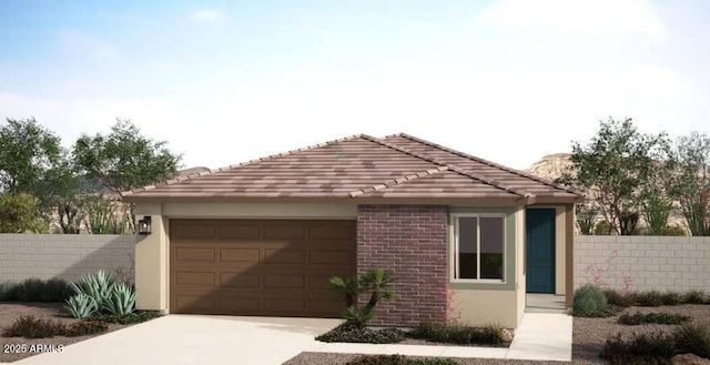 exterior space with a tiled roof, driveway, a garage, fence, and stucco siding