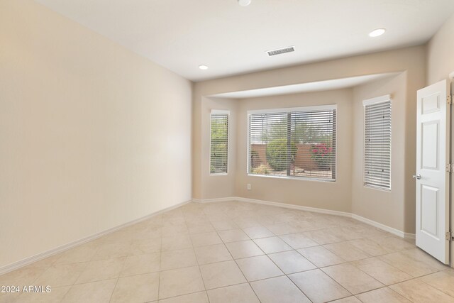 bedroom featuring light tile patterned floors