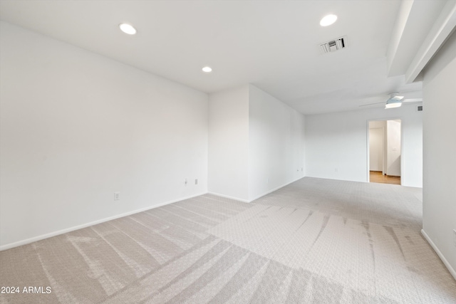 carpeted empty room with ceiling fan