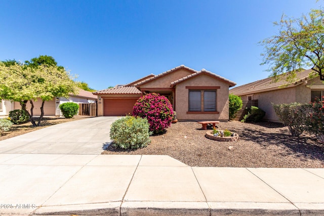 12838 W Desert Mirage Dr, Peoria, AZ 85383 - ranch-style house featuring concrete driveway, stucco siding, an attached garage, and a tile roof