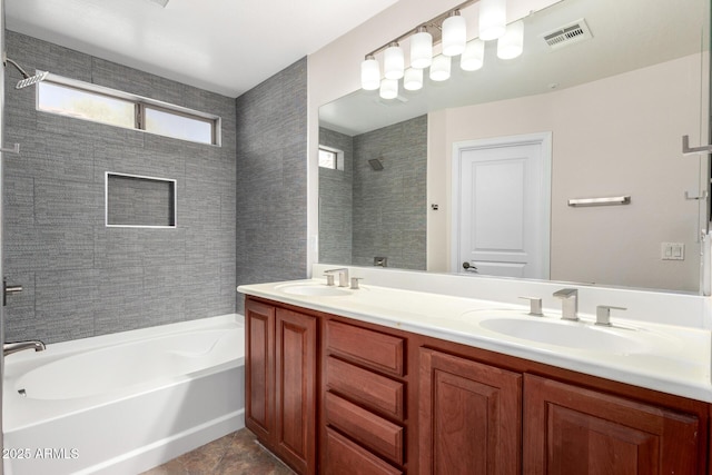 12838 W Desert Mirage Dr, Peoria, AZ 85383 - bathroom featuring visible vents, a sink, double vanity, and  shower combination