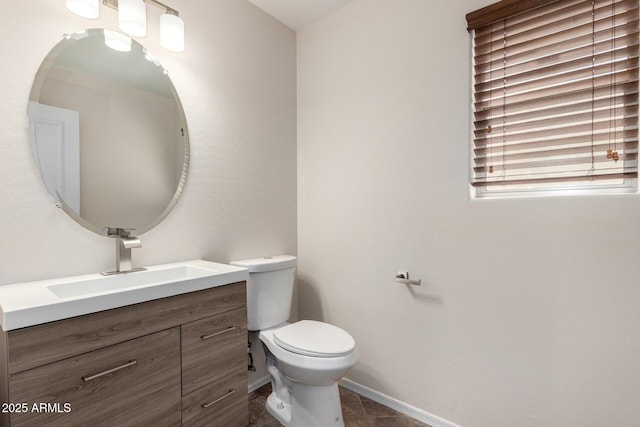 12838 W Desert Mirage Dr, Peoria, AZ 85383 - bathroom featuring vanity, baseboards, and toilet