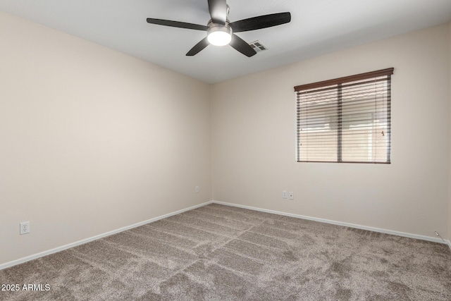 12838 W Desert Mirage Dr, Peoria, AZ 85383 - carpeted spare room featuring visible vents, baseboards, and ceiling fan
