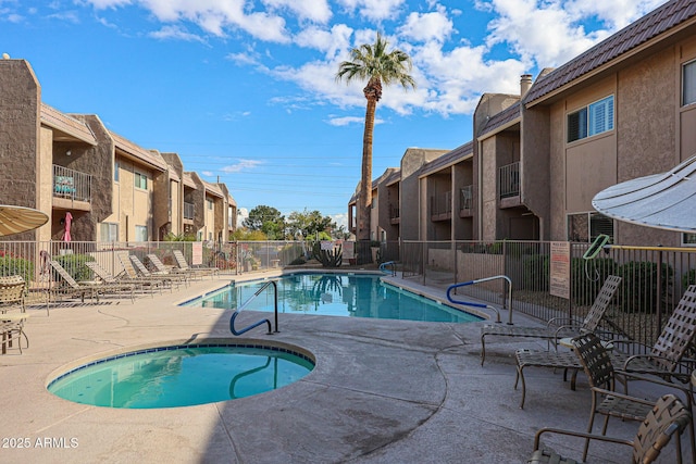 view of swimming pool featuring a patio