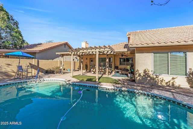 view of pool with a patio area and a pergola