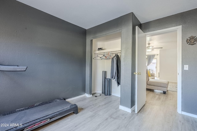 interior space featuring ceiling fan and light wood-type flooring