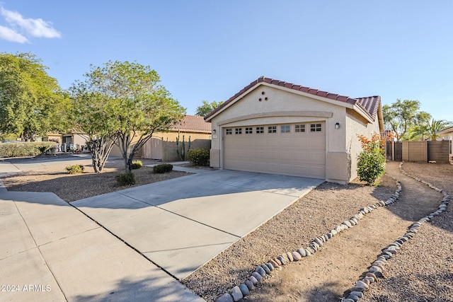 view of front of home with a garage