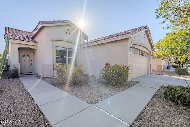 view of front of property with a garage