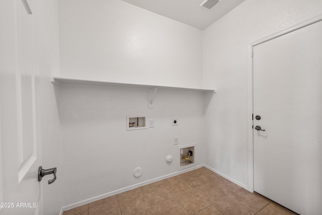 clothes washing area with electric dryer hookup, gas dryer hookup, hookup for a washing machine, and light tile patterned floors