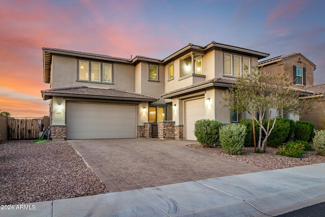 prairie-style home featuring a garage