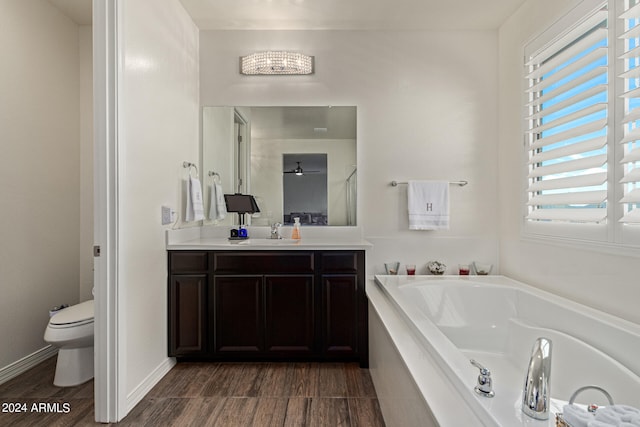 full bathroom featuring vanity, plus walk in shower, toilet, and hardwood / wood-style flooring