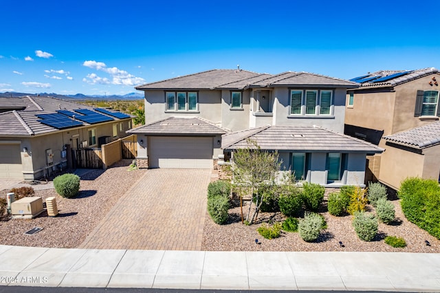 prairie-style house featuring a garage