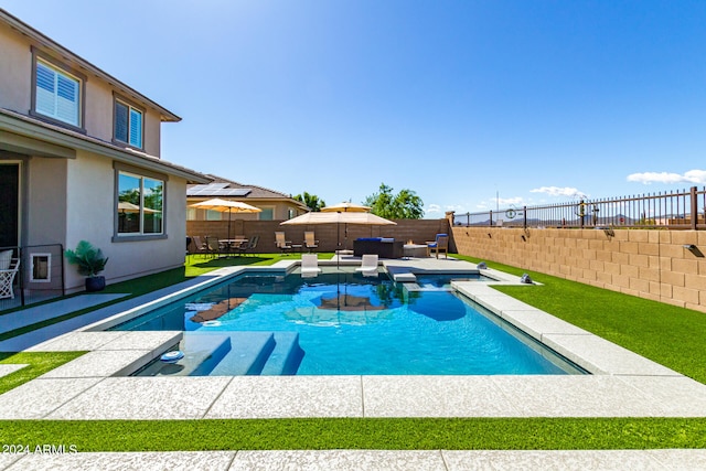 view of swimming pool featuring a patio area