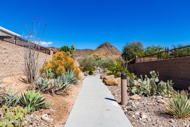 surrounding community with a mountain view