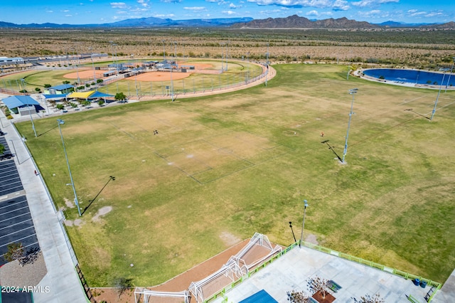 drone / aerial view featuring a rural view and a mountain view