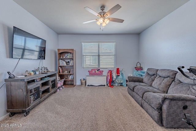 game room with carpet and ceiling fan