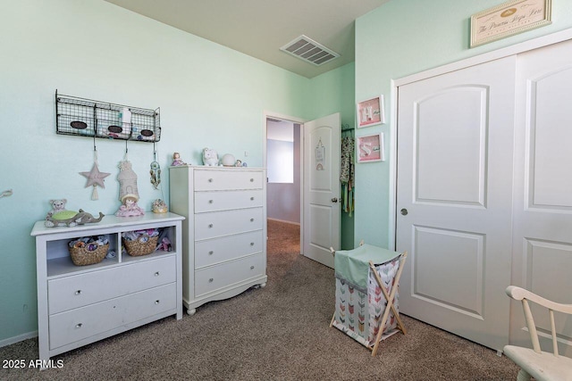 bedroom featuring dark carpet