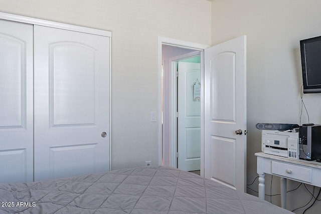 unfurnished bedroom with a closet