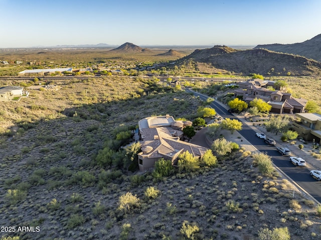 birds eye view of property featuring a mountain view