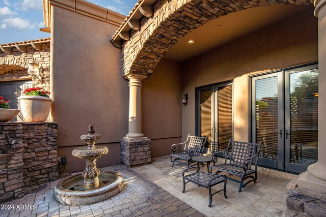 view of terrace featuring french doors