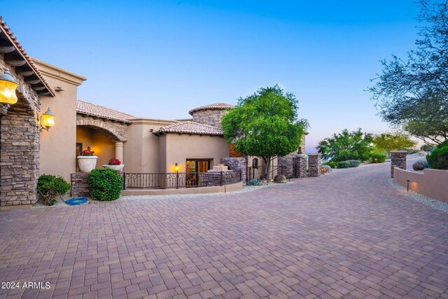 view of patio featuring fence