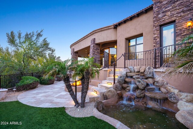 view of yard featuring a patio and fence