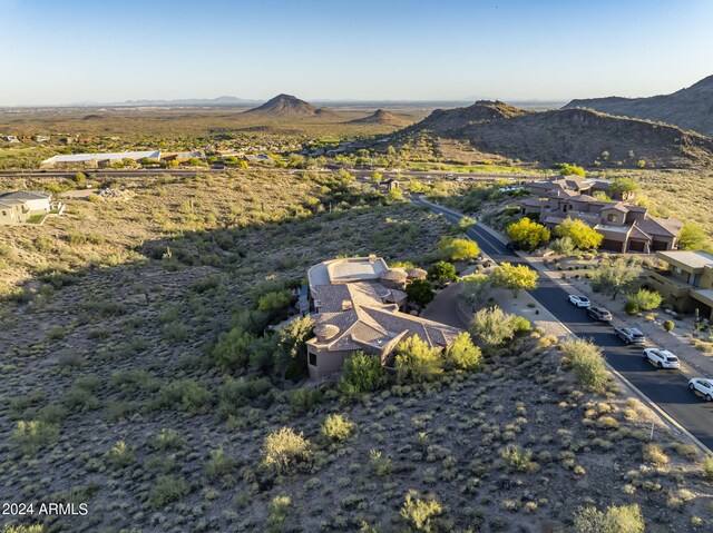 birds eye view of property featuring a mountain view