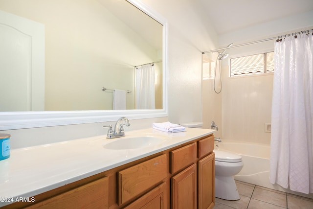 full bathroom featuring tile patterned floors, vanity, toilet, and shower / bath combo with shower curtain