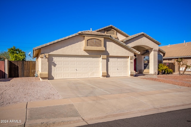 view of front of property with a garage