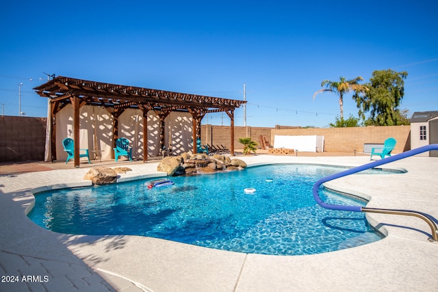 view of pool with a patio area and a pergola