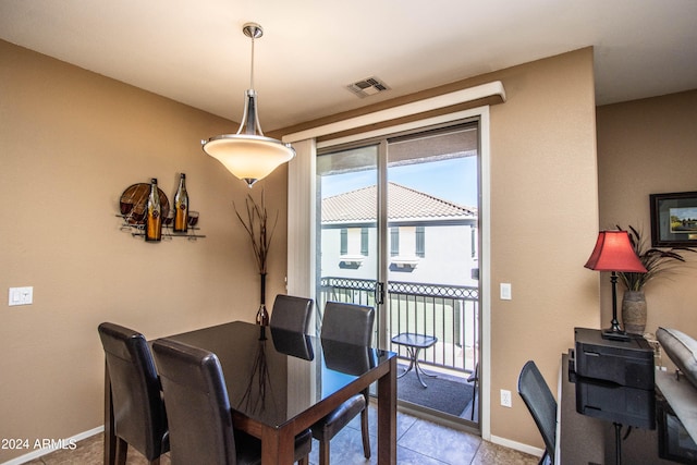 view of tiled dining space