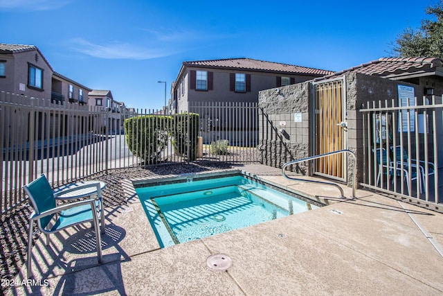 view of swimming pool with a patio