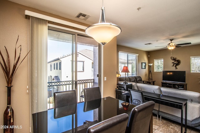 dining room with ceiling fan