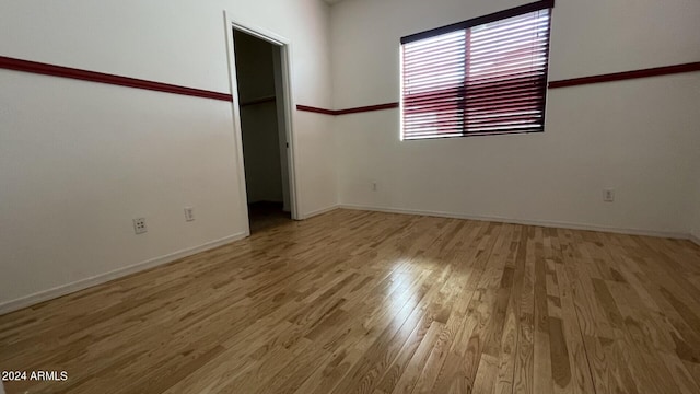 empty room featuring hardwood / wood-style floors