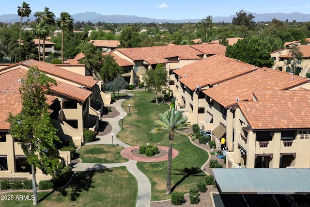 aerial perspective of suburban area with mountains