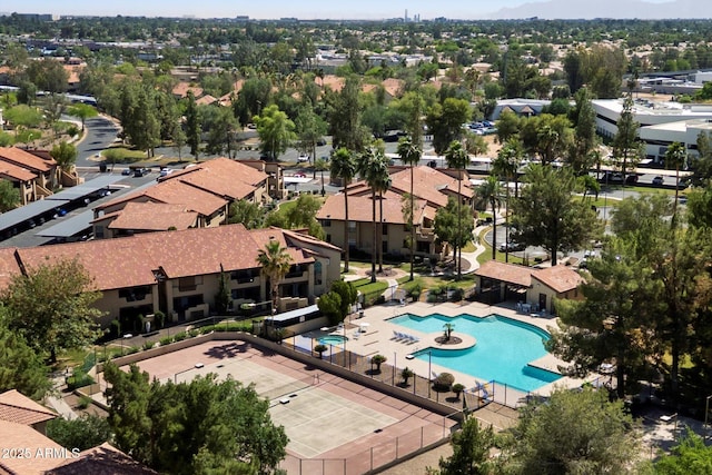 aerial view of residential area with a pool area