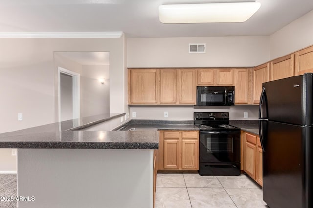 kitchen featuring light brown cabinetry, a peninsula, visible vents, and black appliances