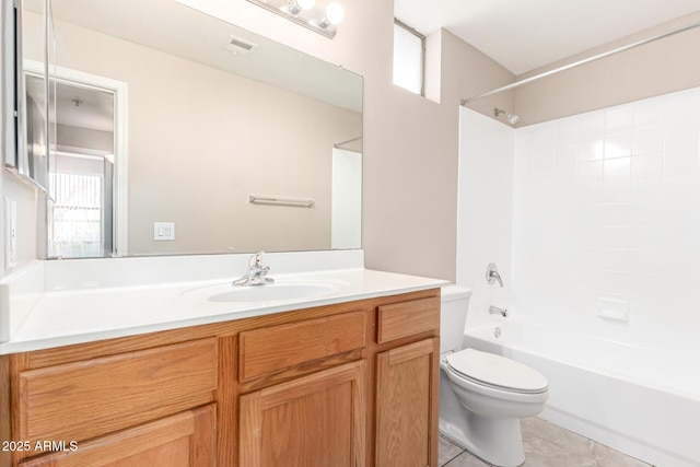 full bathroom with visible vents, vanity, tile patterned floors, toilet, and  shower combination