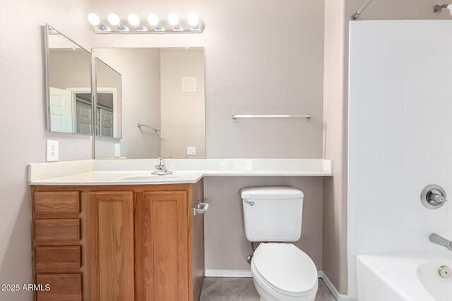 full bathroom featuring vanity, bathing tub / shower combination, and toilet
