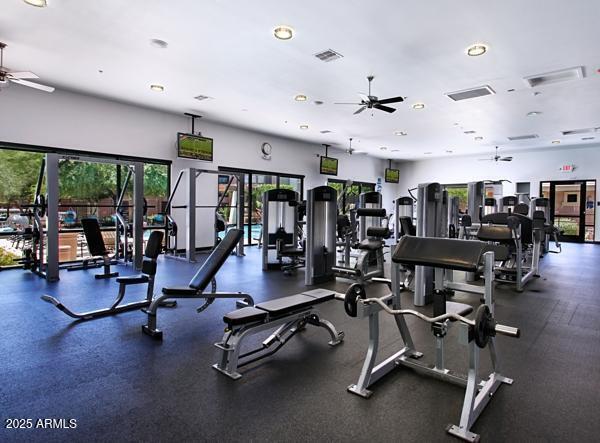 exercise room with recessed lighting, ceiling fan, visible vents, and french doors