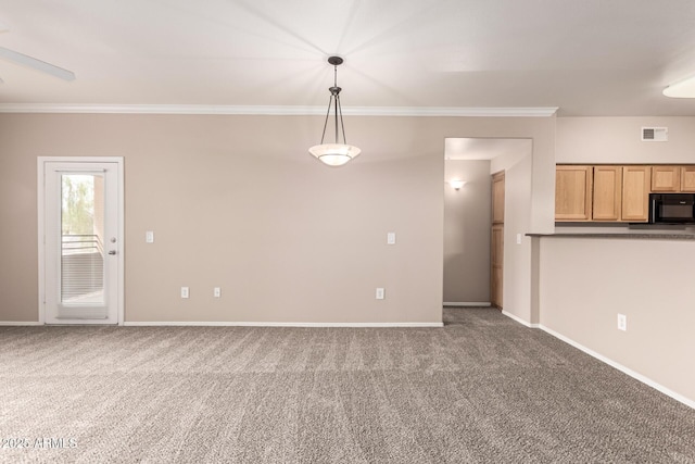 unfurnished living room with crown molding, baseboards, visible vents, and carpet floors