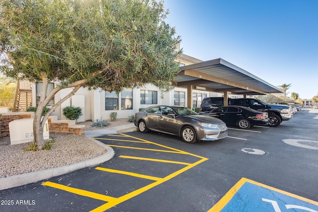 view of parking with a carport