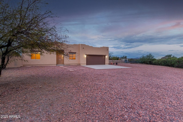 adobe home with a garage