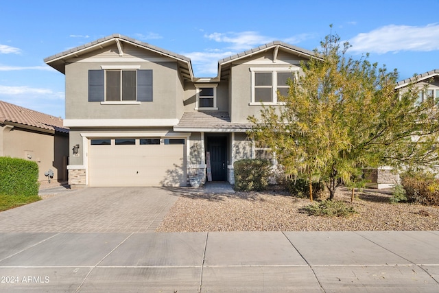 view of front of property with a garage