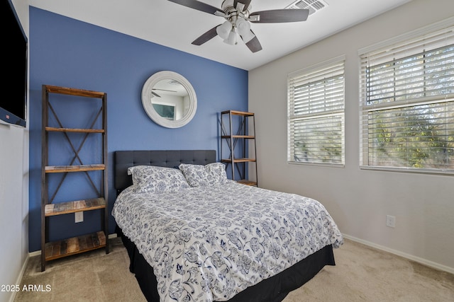 carpeted bedroom featuring ceiling fan